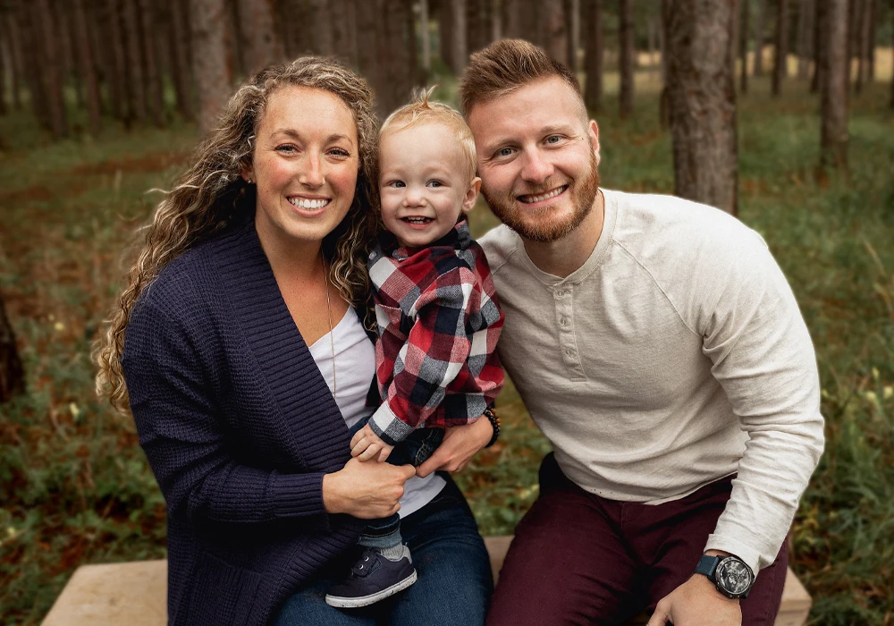 Marcus Kasper and Wife and Child Family Photo in the Woods